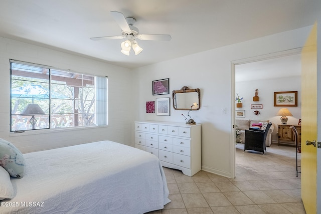 344 S Paseo Sarta Unit C, Green Valley, AZ 85614 - bedroom with light tile patterned floors and a ceiling fan