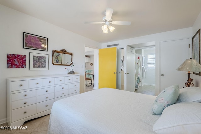 344 S Paseo Sarta Unit C, Green Valley, AZ 85614 - bedroom with light tile patterned flooring and ceiling fan