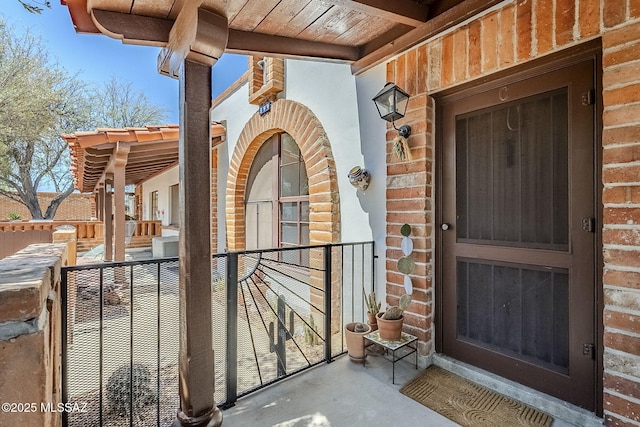 344 S Paseo Sarta Unit C, Green Valley, AZ 85614 - doorway to property featuring brick siding