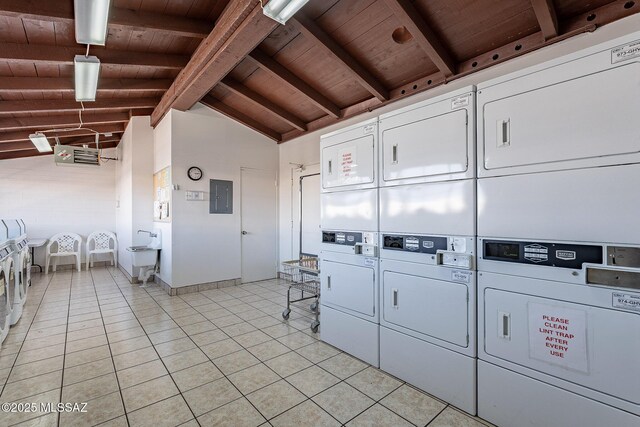 344 S Paseo Sarta Unit C, Green Valley, AZ 85614 - shared laundry featuring wooden ceiling, stacked washer and clothes dryer, electric panel, light tile patterned floors, and separate washer and dryer