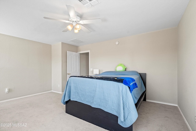 10095 N Mill Crossing Way, Tucson, AZ 85743 - carpeted bedroom with baseboards and a ceiling fan