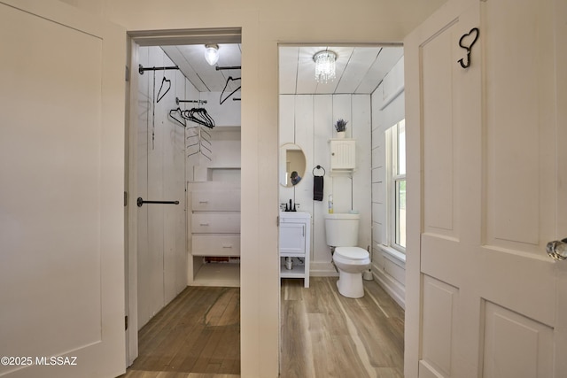 203 N Kellum Ave, Bowie, AZ 85605 - full bathroom featuring toilet, vanity, and wood finished floors