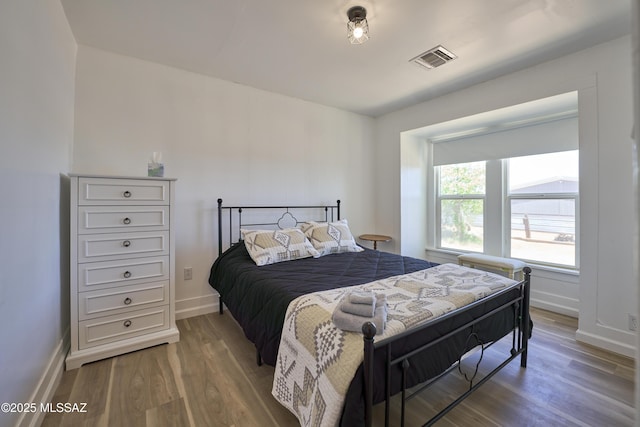 203 N Kellum Ave, Bowie, AZ 85605 - bedroom featuring light wood-type flooring and baseboards
