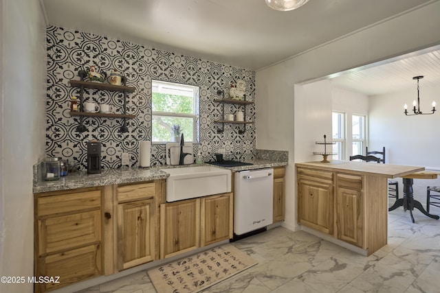 203 N Kellum Ave, Bowie, AZ 85605 - kitchen with open shelves, white dishwasher, a peninsula, light marble finish flooring, and a chandelier