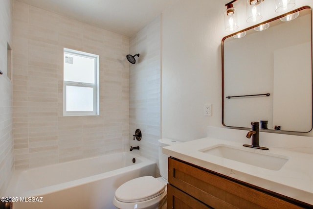 bathroom with vanity, toilet, and shower / bathtub combination