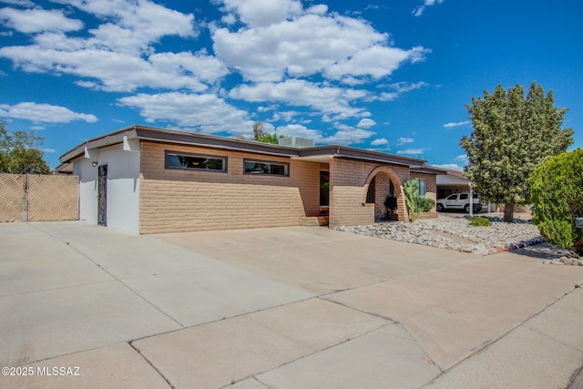 3400 W Marlene St, Tucson, AZ 85741 - view of front of home with brick siding and fence