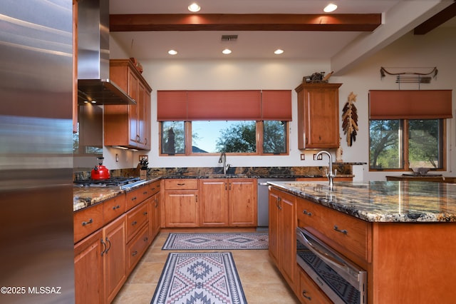 12800 W Arivaca Rd, Amado, AZ 85645 - kitchen featuring wall chimney exhaust hood, stainless steel appliances, a sink, recessed lighting, and dark stone countertops