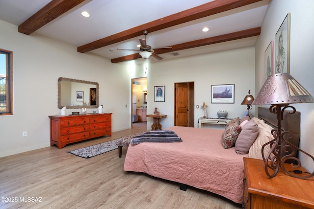 12800 W Arivaca Rd, Amado, AZ 85645 - bedroom with wood finished floors, beam ceiling, baseboards, recessed lighting, and ceiling fan