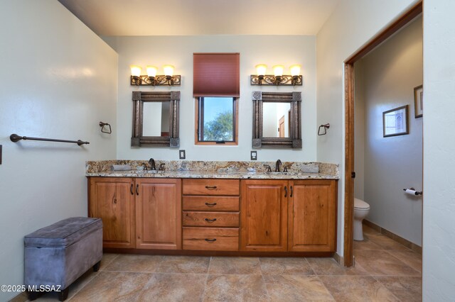 12800 W Arivaca Rd, Amado, AZ 85645 - bathroom featuring toilet and double vanity