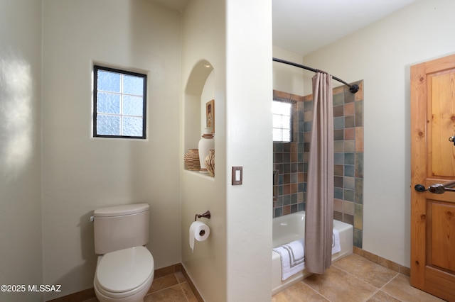 12800 W Arivaca Rd, Amado, AZ 85645 - full bath featuring shower / bath combo, toilet, and baseboards