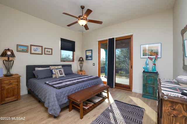 12800 W Arivaca Rd, Amado, AZ 85645 - bedroom with access to outside, light wood finished floors, baseboards, and ceiling fan