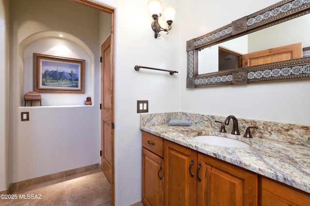 12800 W Arivaca Rd, Amado, AZ 85645 - bathroom with vanity and baseboards
