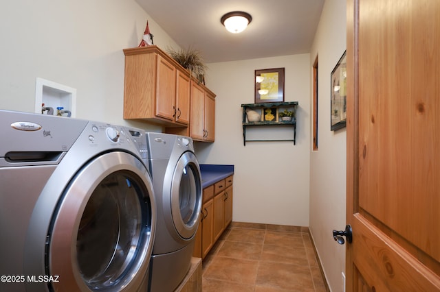 12800 W Arivaca Rd, Amado, AZ 85645 - laundry room with washer and dryer, cabinet space, baseboards, and light tile patterned floors