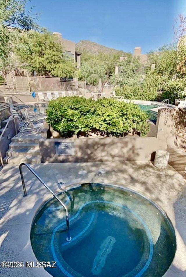6655 N Canyon Crest Dr Unit 13277, Tucson, AZ 85750 - view of swimming pool featuring a community hot tub