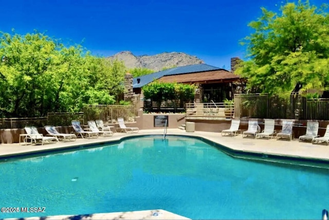 6655 N Canyon Crest Dr Unit 13277, Tucson, AZ 85750 - community pool featuring a patio and a mountain view