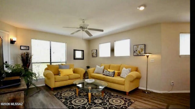 6655 N Canyon Crest Dr Unit 13277, Tucson, AZ 85750 - living area featuring wood finished floors, baseboards, and a ceiling fan