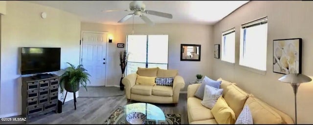 6655 N Canyon Crest Dr Unit 13277, Tucson, AZ 85750 - living room with ceiling fan and wood finished floors