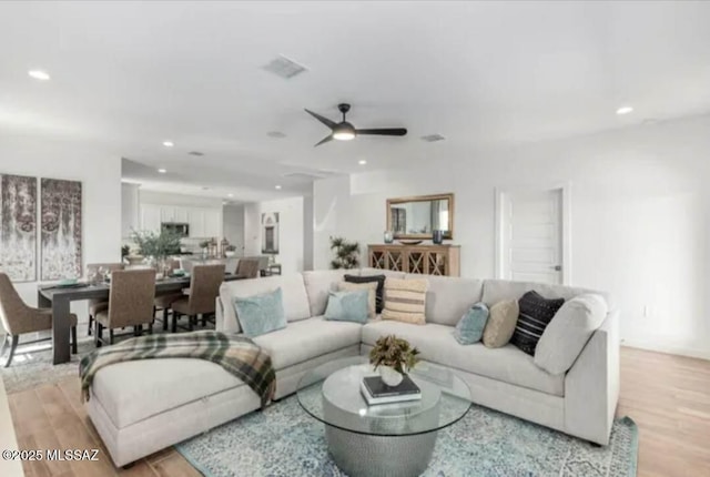 12734 E Russo Dr, Vail, AZ 85641 - living area with light wood-style flooring, recessed lighting, and ceiling fan