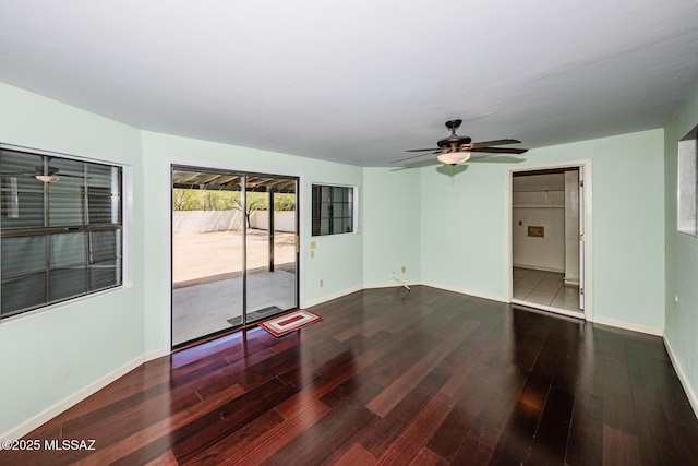 2607 E Adams St, Tucson, AZ 85716 - unfurnished room featuring wood finished floors, a ceiling fan, and baseboards