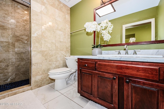2607 E Adams St, Tucson, AZ 85716 - full bath with tile walls, toilet, tiled shower, vanity, and marble finish flooring
