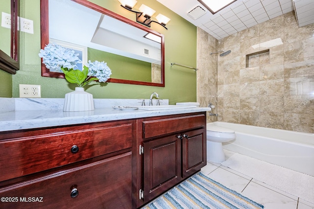 2607 E Adams St, Tucson, AZ 85716 - full bath featuring toilet, vanity, washtub / shower combination, and tile patterned floors