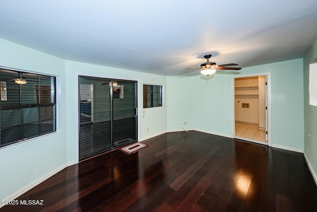 2607 E Adams St, Tucson, AZ 85716 - empty room featuring a ceiling fan, wood finished floors, and baseboards