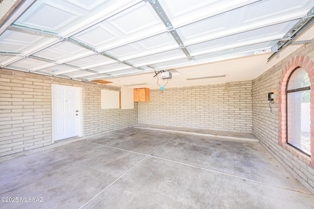 2607 E Adams St, Tucson, AZ 85716 - garage featuring a garage door opener