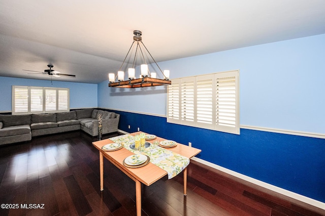 2607 E Adams St, Tucson, AZ 85716 - dining area with wood finished floors, ceiling fan, baseboards, and a chandelier