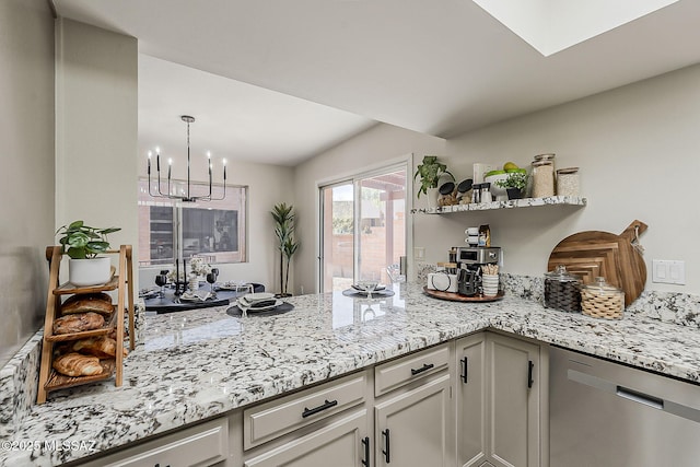 2756 S Via Del Bac, Green Valley, AZ 85622 - kitchen featuring dishwasher, open shelves, a chandelier, and light stone counters