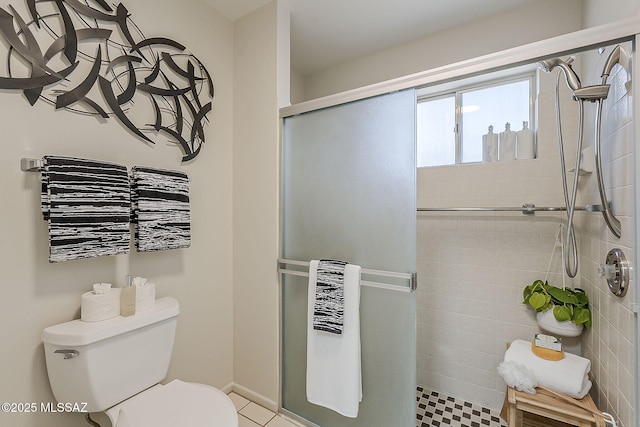 2756 S Via Del Bac, Green Valley, AZ 85622 - bathroom featuring a shower stall, toilet, and tile patterned floors