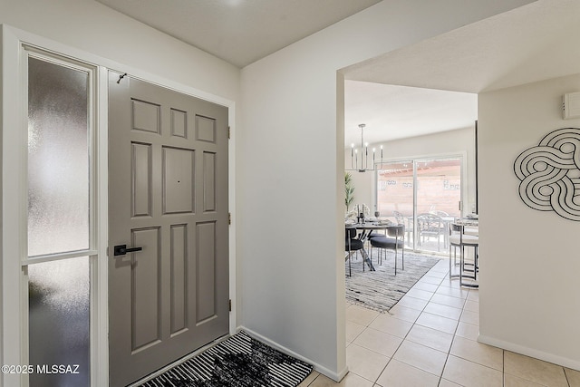 2756 S Via Del Bac, Green Valley, AZ 85622 - foyer with baseboards, a chandelier, and light tile patterned flooring