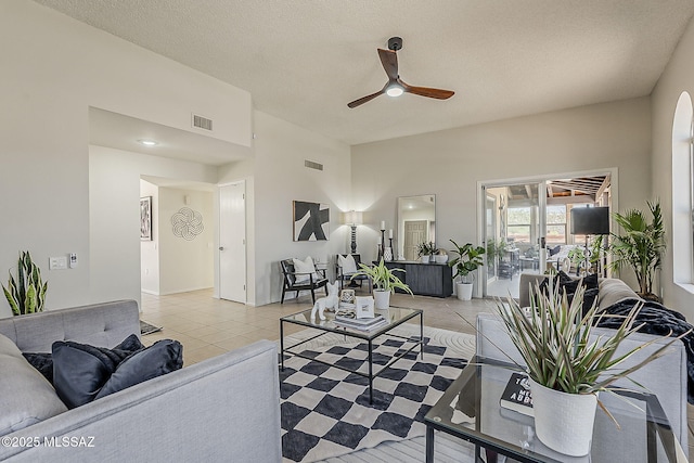 2756 S Via Del Bac, Green Valley, AZ 85622 - living area featuring a ceiling fan, light tile patterned floors, and baseboards