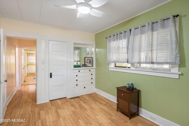 24 Black Knob, Bisbee, AZ 85603 - bedroom with light wood finished floors, ornamental molding, baseboards, and a closet