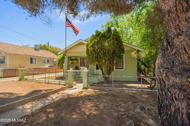 24 Black Knob, Bisbee, AZ 85603 - view of front facade featuring a fenced front yard, a gate, and a porch