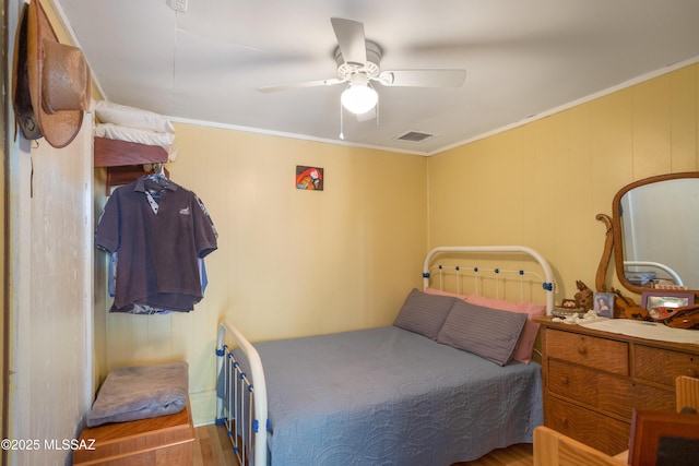 24 Black Knob, Bisbee, AZ 85603 - bedroom with ornamental molding, wood finished floors, and a ceiling fan