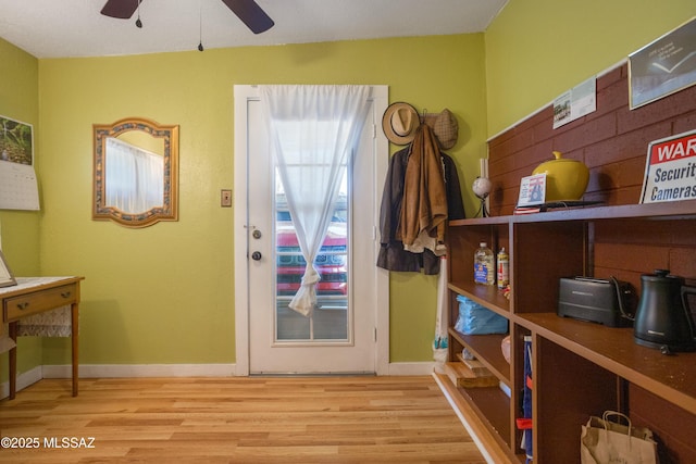 24 Black Knob, Bisbee, AZ 85603 - entryway with ceiling fan, wood finished floors, and baseboards