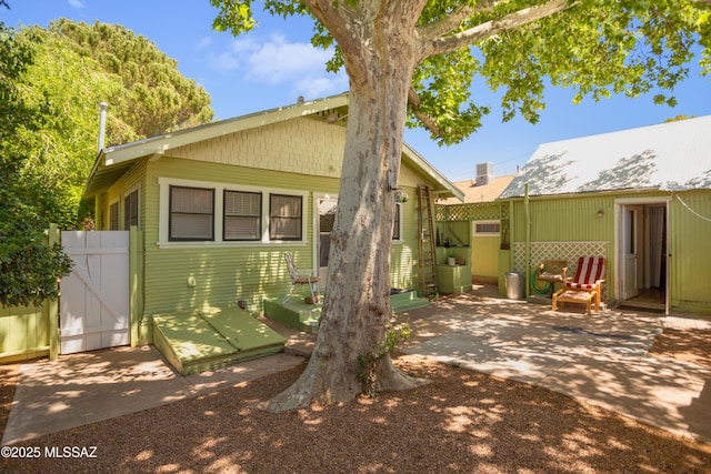 24 Black Knob, Bisbee, AZ 85603 - view of front of home with a gate and a patio