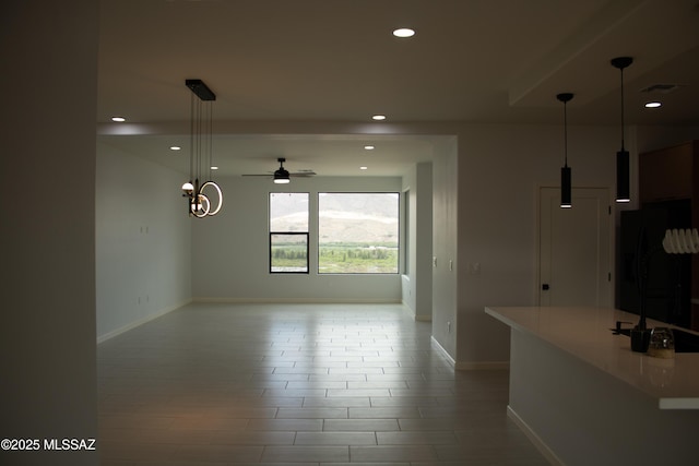 481 Calle Cipres, Rio Rico, AZ 85648 - kitchen with baseboards, a ceiling fan, recessed lighting, decorative light fixtures, and open floor plan