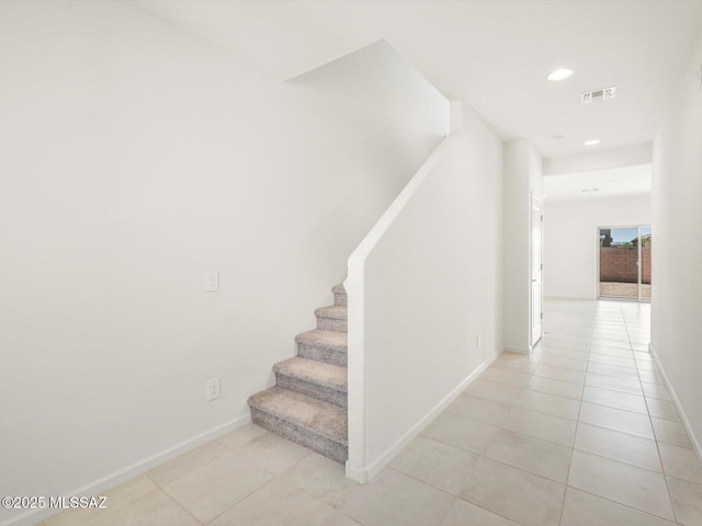 4743 E Julian Wash Dr, Tucson, AZ 85706 - staircase featuring tile patterned floors, baseboards, and recessed lighting
