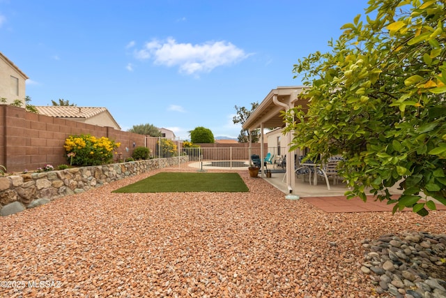 9429 N Elan Ln, Tucson, AZ 85742 - fenced backyard with a patio area