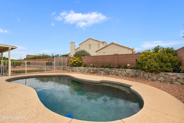 9429 N Elan Ln, Tucson, AZ 85742 - view of swimming pool featuring a fenced backyard