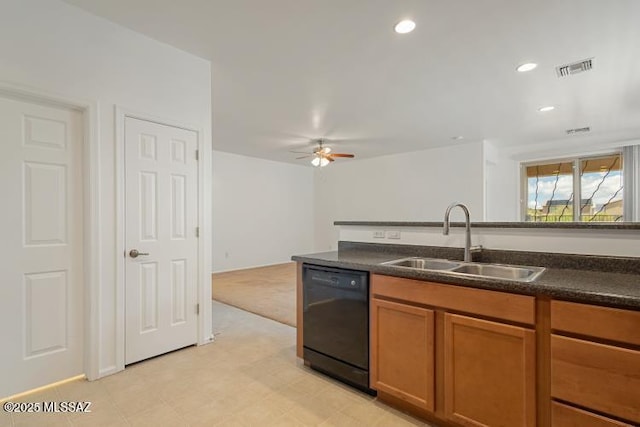 6902 W Leeward Cove Way, Tucson, AZ 85757 - kitchen with black dishwasher, a sink, dark countertops, brown cabinetry, and recessed lighting