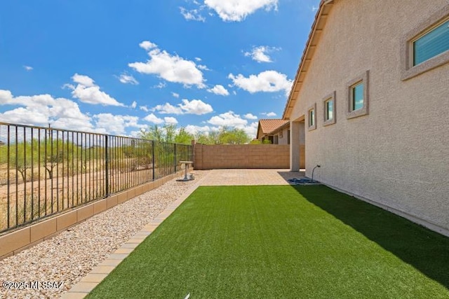 6902 W Leeward Cove Way, Tucson, AZ 85757 - view of yard featuring a patio