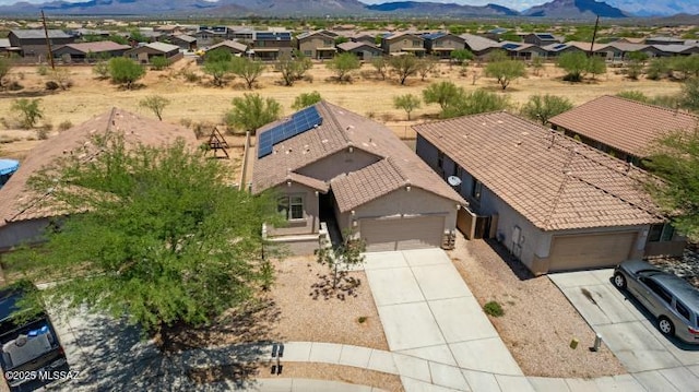 6902 W Leeward Cove Way, Tucson, AZ 85757 - aerial view of residential area with a mountainous background