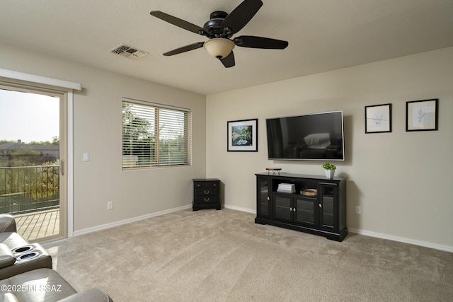 368 W Sacaton Canyon Dr, Oro Valley, AZ 85755 - carpeted living room with a ceiling fan and baseboards
