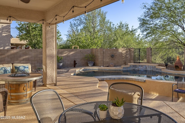 368 W Sacaton Canyon Dr, Oro Valley, AZ 85755 - fenced backyard featuring a patio, an outdoor fire pit, and ceiling fan