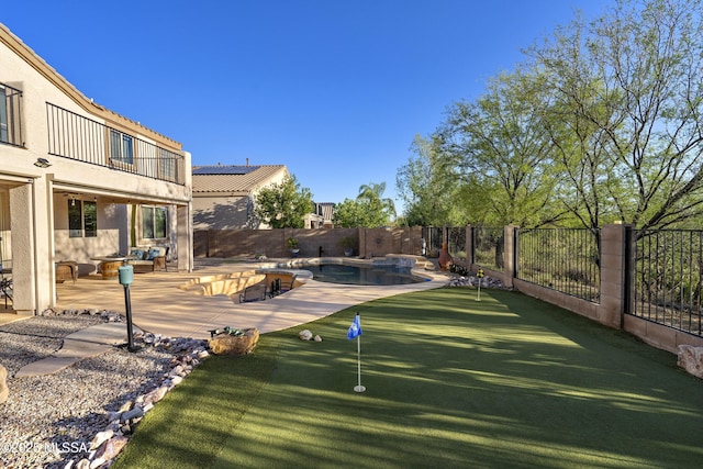 368 W Sacaton Canyon Dr, Oro Valley, AZ 85755 - view of community with a putting green, a fenced backyard, a pool, a patio area, and a hot tub