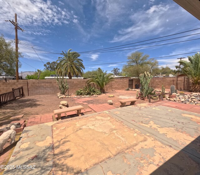 6509 E 39th St, Tucson, AZ 85730 - view of patio with a fenced backyard