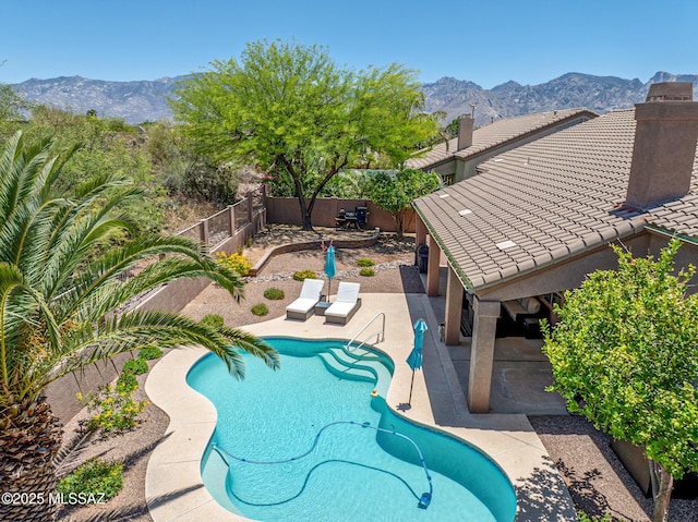 218 W Milbrae Springs Dr, Oro Valley, AZ 85755 - view of pool featuring a mountain view, a fenced backyard, and a patio