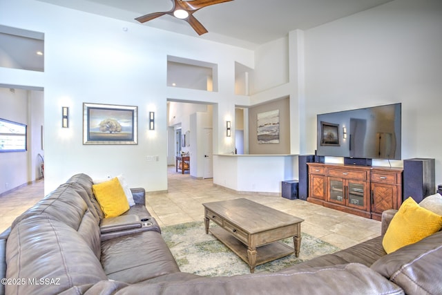 218 W Milbrae Springs Dr, Oro Valley, AZ 85755 - living area with a ceiling fan, a high ceiling, and light tile patterned flooring